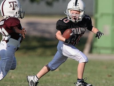 When Should I Let My Child Play Tackle Football?